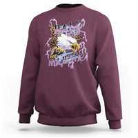Maroon eagle graphic sweatshirt with “Bald And Majestic” lettering on chest