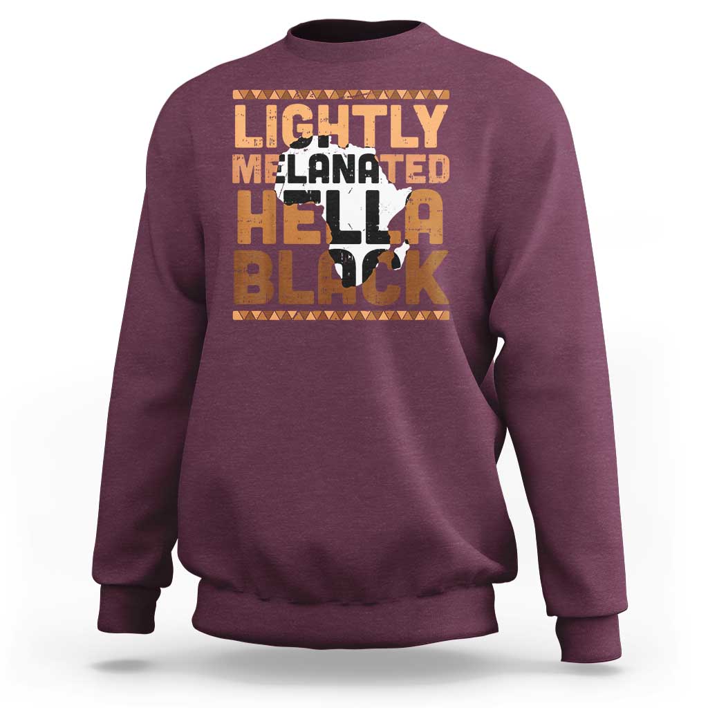 Maroon crewneck sweatshirt with orange/black 'Lightly Melanated Hella Black' graphic