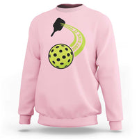 Light pink sweatshirt with pickleball paddle and green pickle graphic on chest
