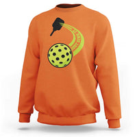 Orange sweatshirt with pickleball paddle and green pickle graphic on chest