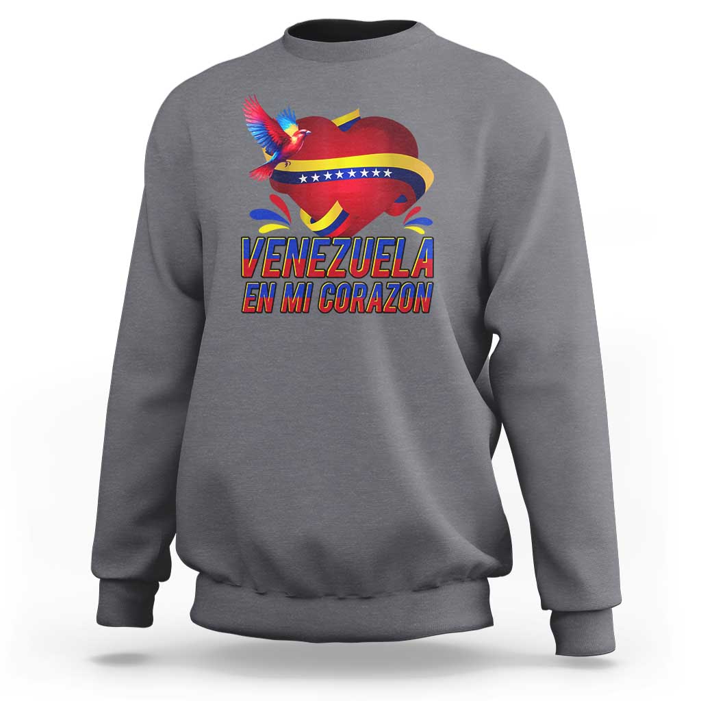 Gray heather sweatshirt with heart flag bird graphic and 'Venezuela' text