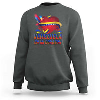 Dark green heather sweatshirt with heart flag bird graphic and 'Venezuela' text