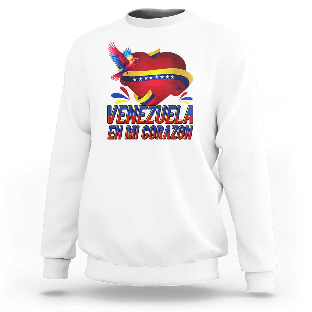 White sweatshirt with heart flag bird graphic and 'Venezuela' text
