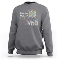 Dark heather gray crewneck sweatshirt with colorful dandelion dot graphic and motivational text on chest