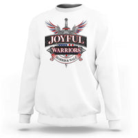 White crewneck sweatshirt with colorful eagle and sword “Joyful Warriors” graphic on chest