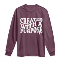 Maroon long-sleeve T-shirt: 'CREATED WITH A PURPOSE' and cross graphic