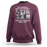 Maroon crewneck sweatshirt with front graphic of historical figures and slogan text