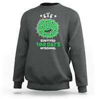 Charcoal crewneck sweatshirt with green monster eye graphic, “Survived 100 Days Offschool”