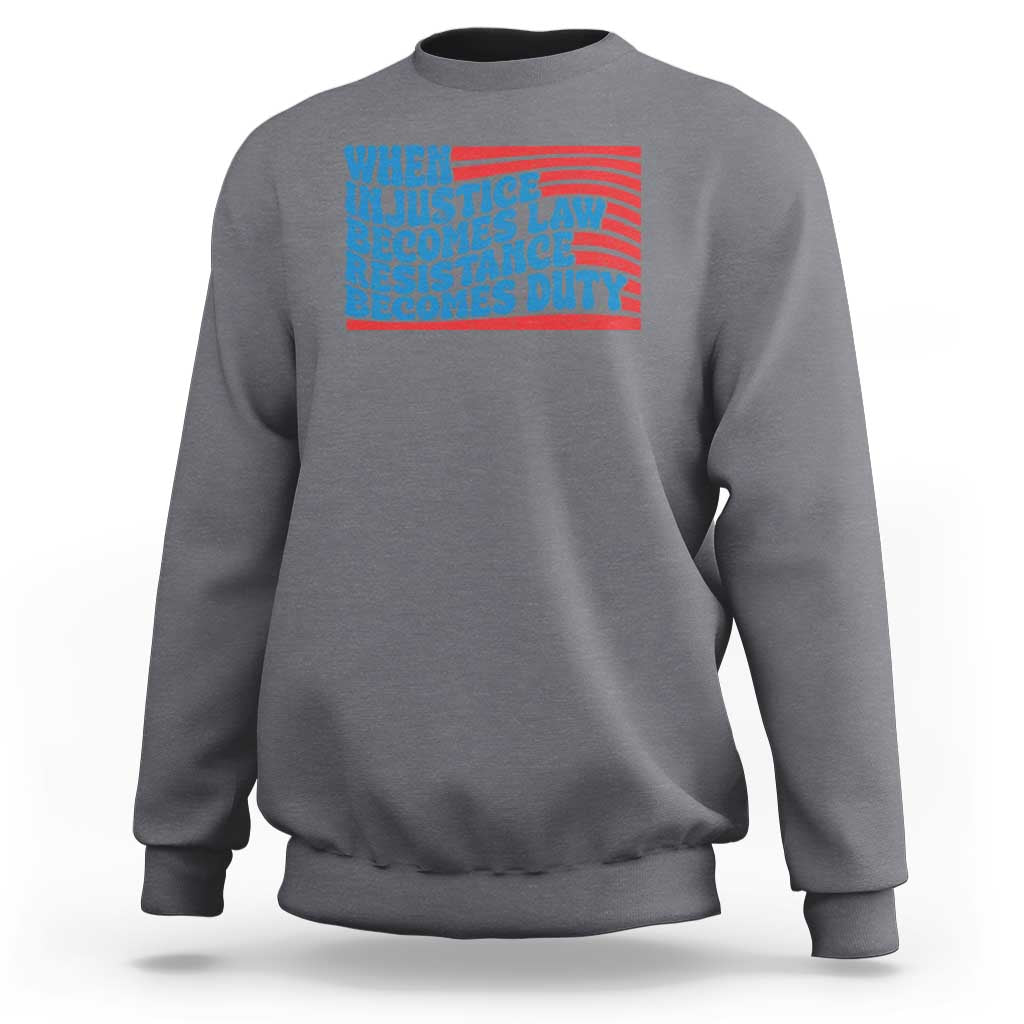 Charcoal crewneck sweatshirt with quote graphic reading 'When injustice becomes law'