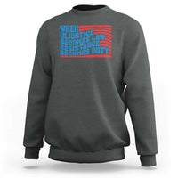 Dark heather crewneck sweatshirt with quote graphic reading 'When injustice becomes law'