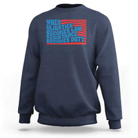 Navy crewneck sweatshirt with quote graphic reading 'When injustice becomes law'