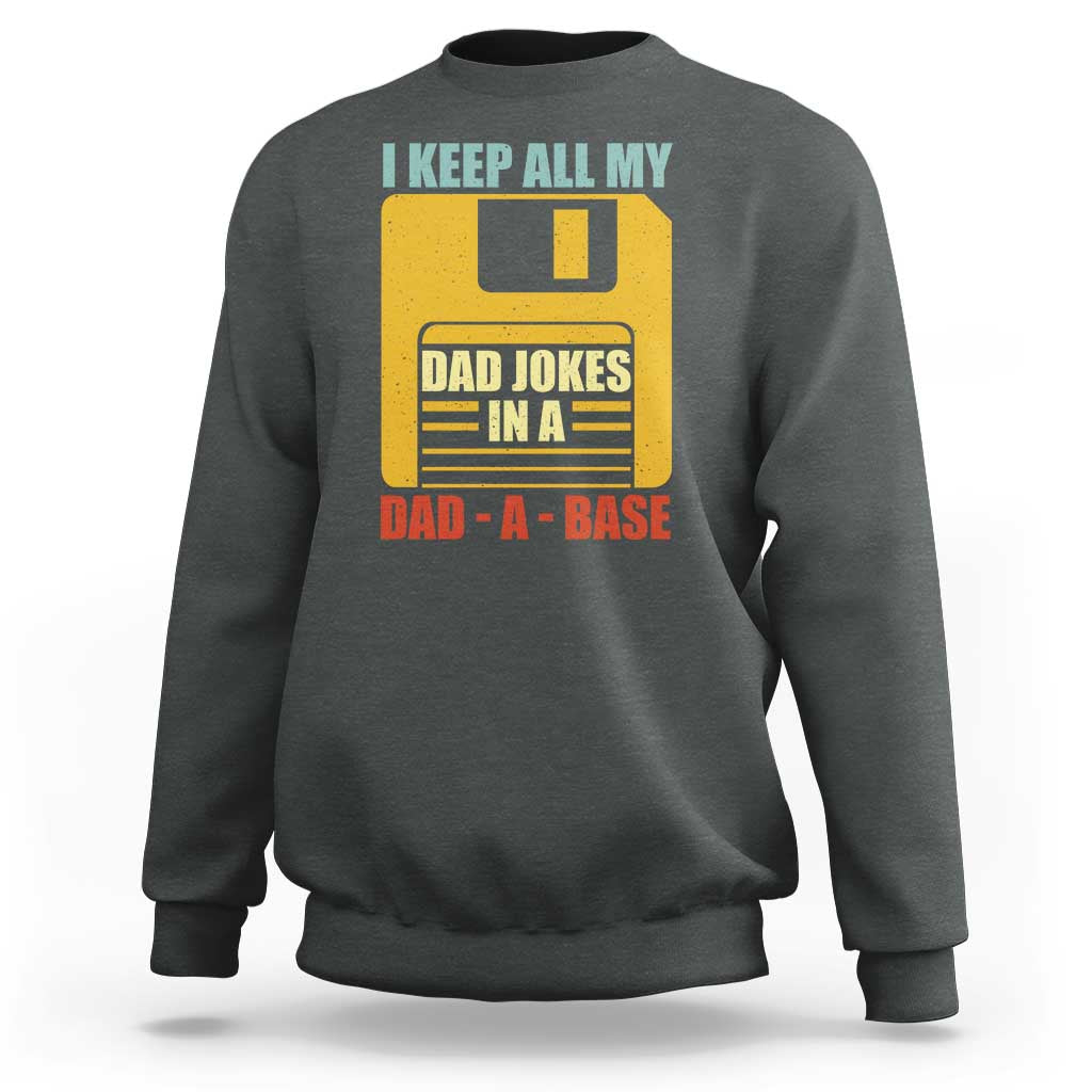 Dark heather crewneck sweatshirt with front graphic text "DAD JOKES IN A DAD-A-BASE"