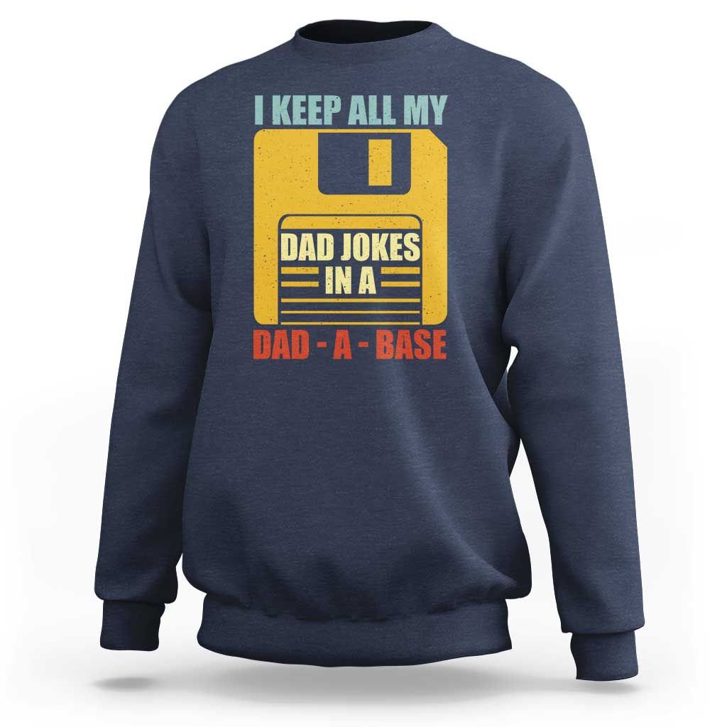 Navy crewneck sweatshirt with front graphic text "DAD JOKES IN A DAD-A-BASE"
