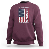 Maroon coaching sweatshirt with American flag and vertical 'Legend' graphic