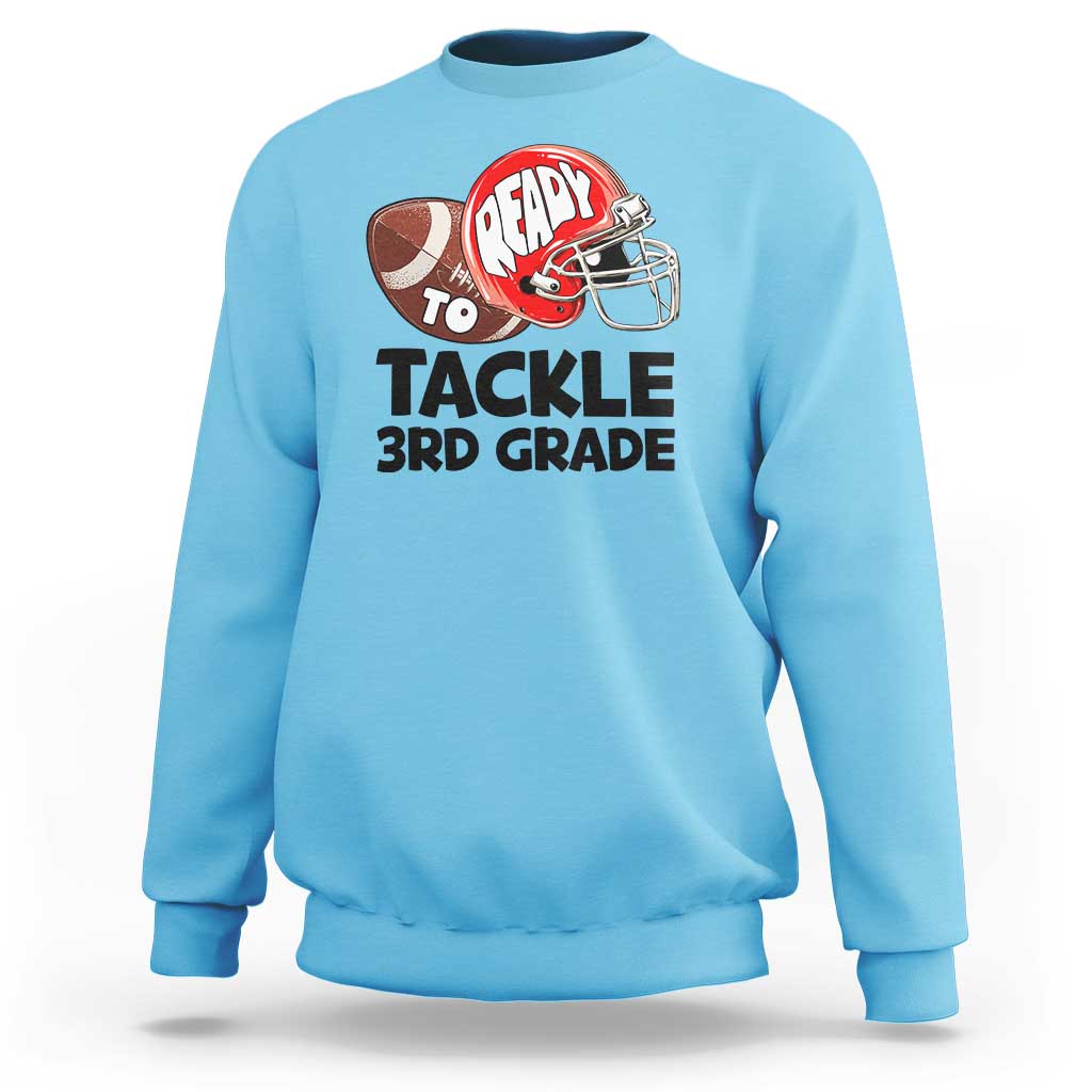 Light blue sweatshirt with football helmet "Ready to Tackle 3rd Grade" print