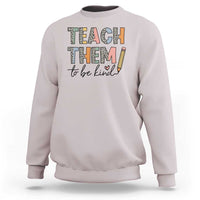 Ice gray teacher sweatshirt with “Teach Them” and “to be kind” pencil-style design.