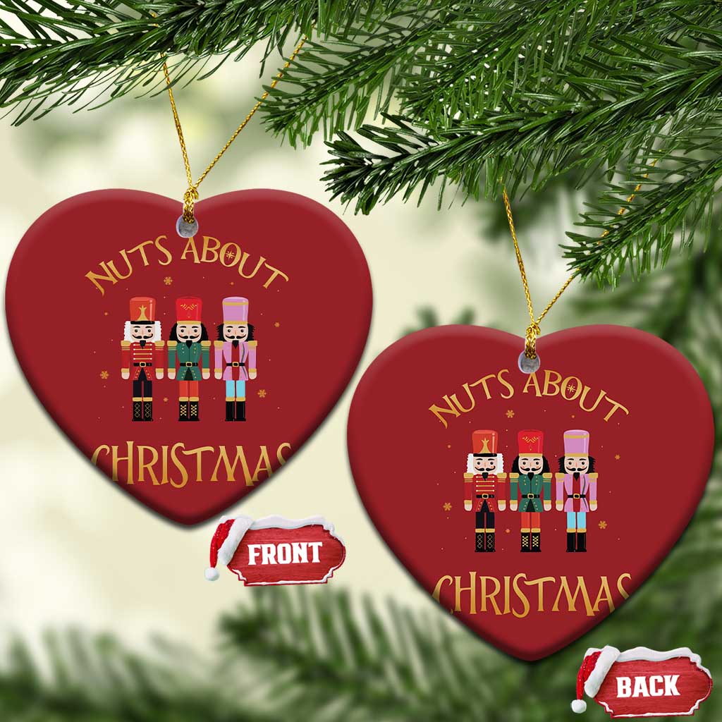 Set of 2 red heart-shaped Christmas ornaments with “Nuts About Christmas” nutcracker figures