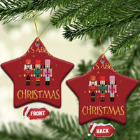 Set of 2 red star-shaped Christmas ornaments with “Nuts About Christmas” nutcracker figures