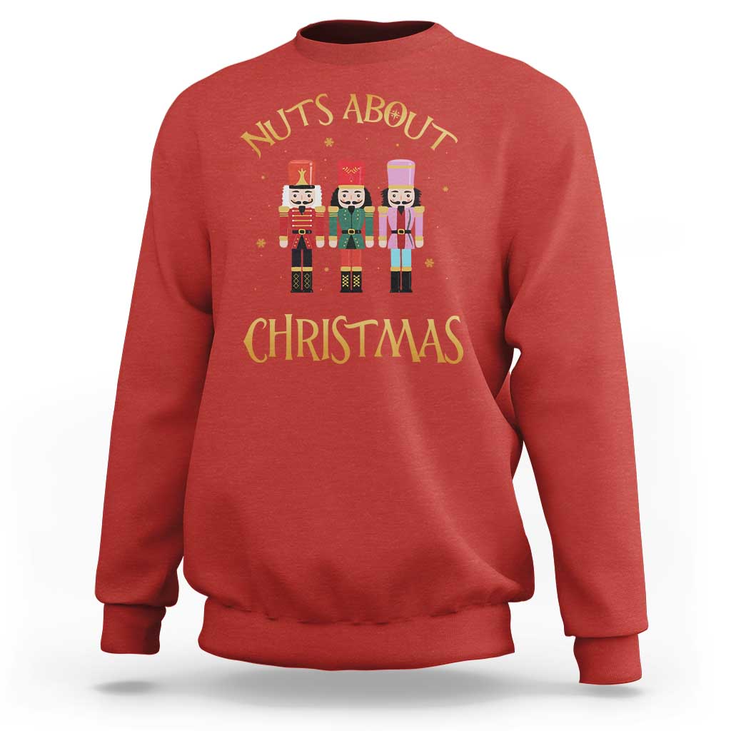 Red crewneck Christmas nutcracker sweatshirt with “Nuts About Christmas” graphic