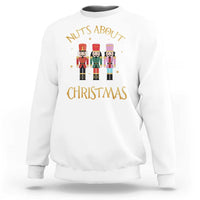 White crewneck Christmas nutcracker sweatshirt with “Nuts About Christmas” graphic