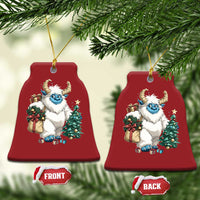Pair of red tree-shaped Christmas ornaments with cartoon yeti, shown with FRONT and BACK tags