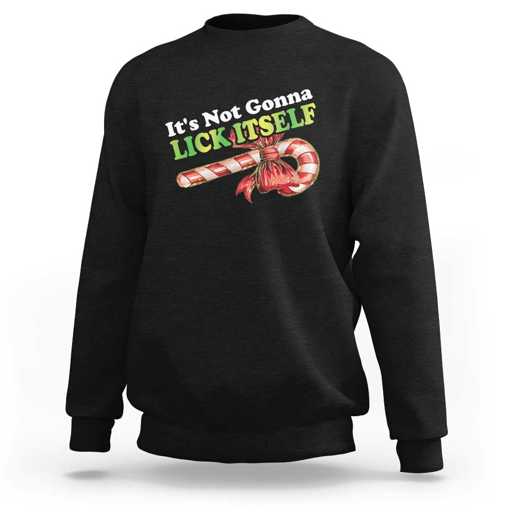 Black crewneck sweatshirt with “It’s Not Gonna LICK ITSELF” candy cane graphic