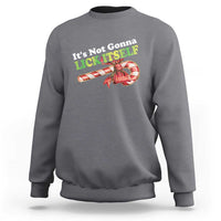 Dark heather crewneck sweatshirt with “It’s Not Gonna LICK ITSELF” candy cane graphic