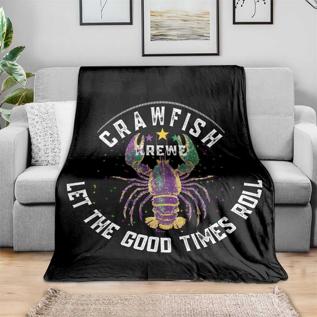 Black throw blanket on a sofa with colorful crawfish design and “Let the Good Times Roll”