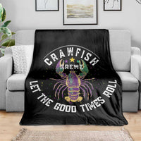 Black throw blanket on a sofa with colorful crawfish design and “Let the Good Times Roll”