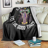 Black throw blanket draped over a chair, showing colorful crawfish art and “Good Times Roll”