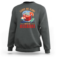 Dark heather crewneck sweatshirt with colorful Negroni-style drink graphic and bold text.