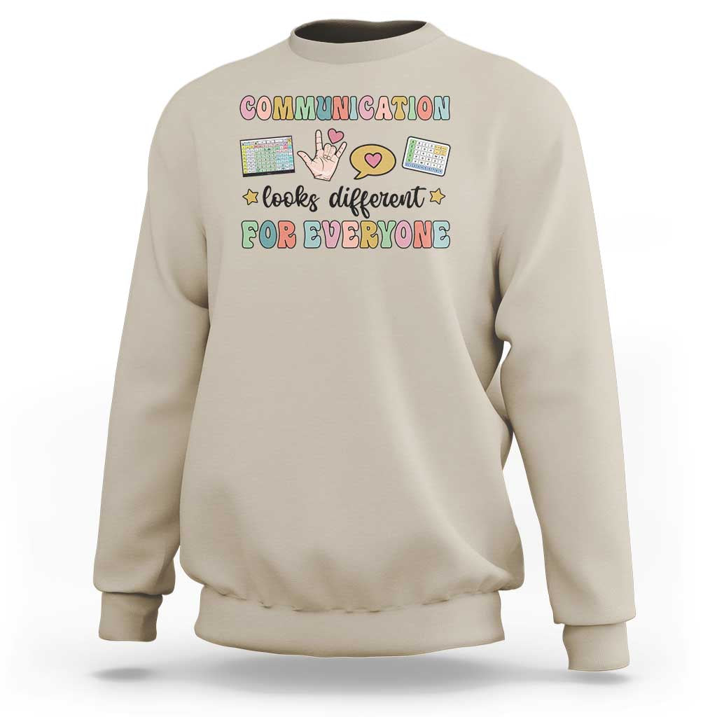Sand crewneck graphic sweatshirt with colorful “Communication for everyone” text design