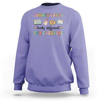 Violet crewneck graphic sweatshirt with colorful “Communication for everyone” text design