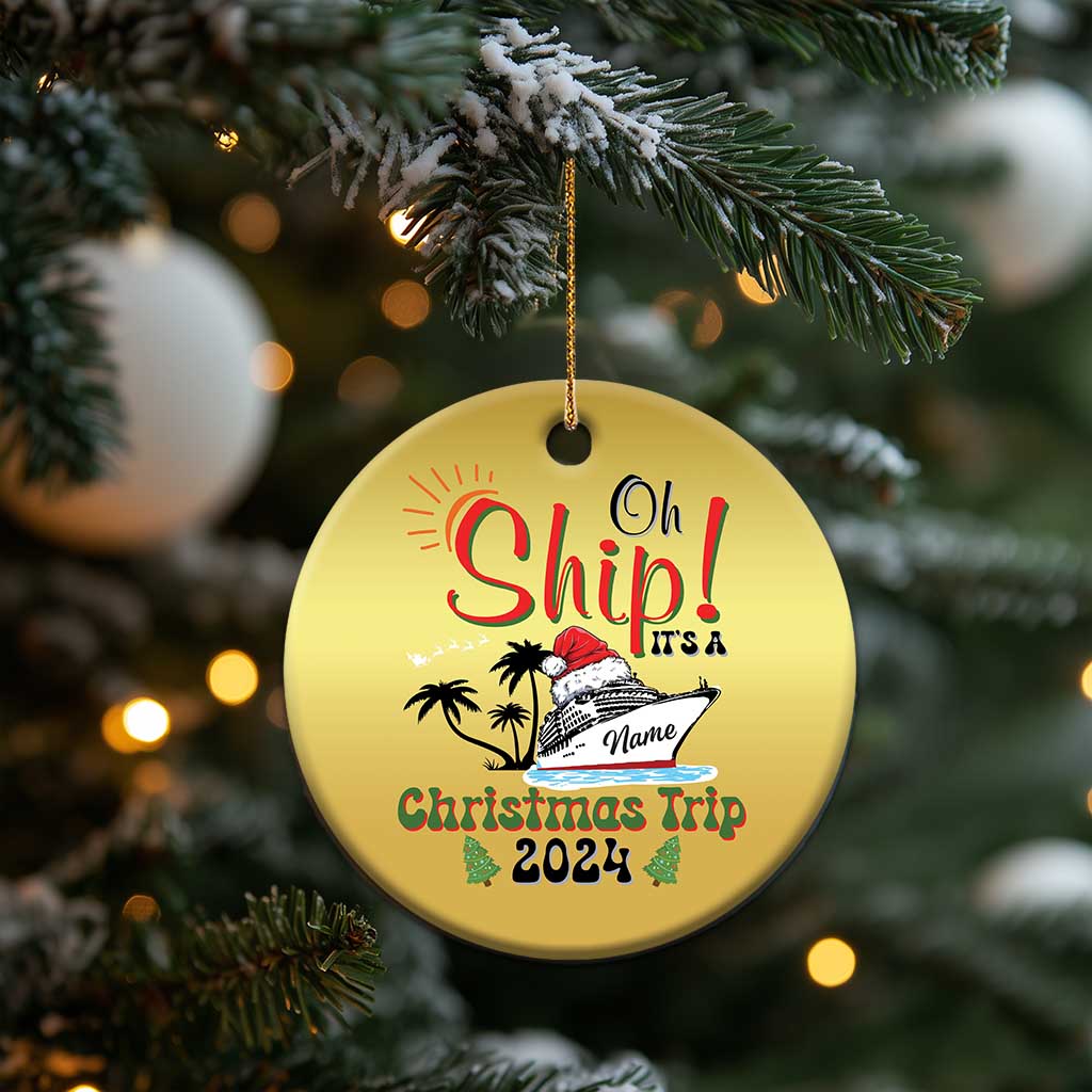 Gold circle Christmas ornament hanging from a gold string: “Oh Ship! Christmas Trip 2024”.