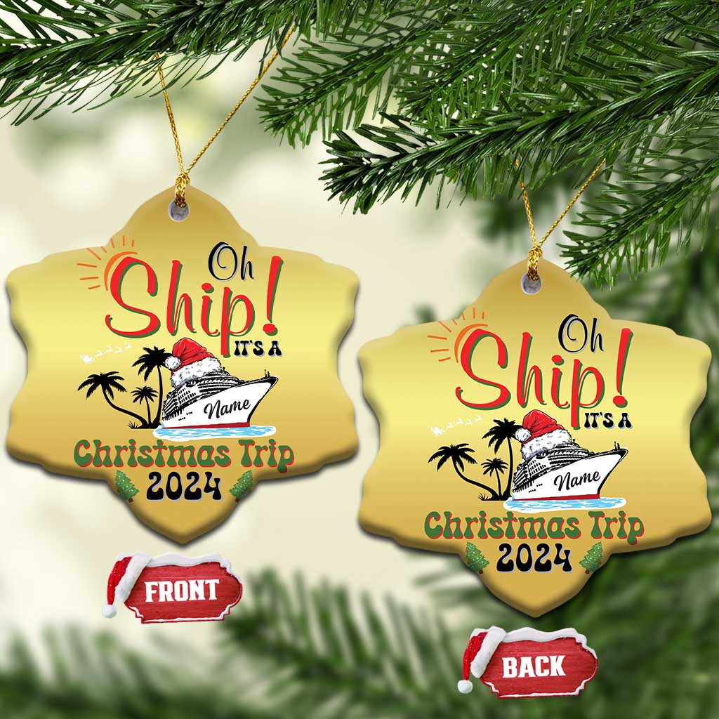 Gold heart ornament pair hanging on a tree with “Oh Ship! It’s a Christmas Trip 2024”.