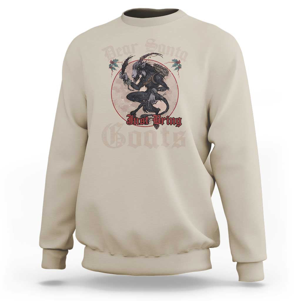 Sand Christmas sweatshirt with “Dear Santa” goat graphic on front.