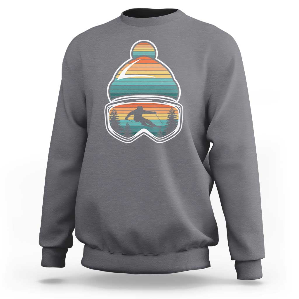Ski-themed crewneck sweatshirt in dark heather gray with retro mountain goggles graphic