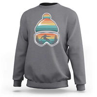 Ski-themed crewneck sweatshirt in dark heather gray with retro mountain goggles graphic
