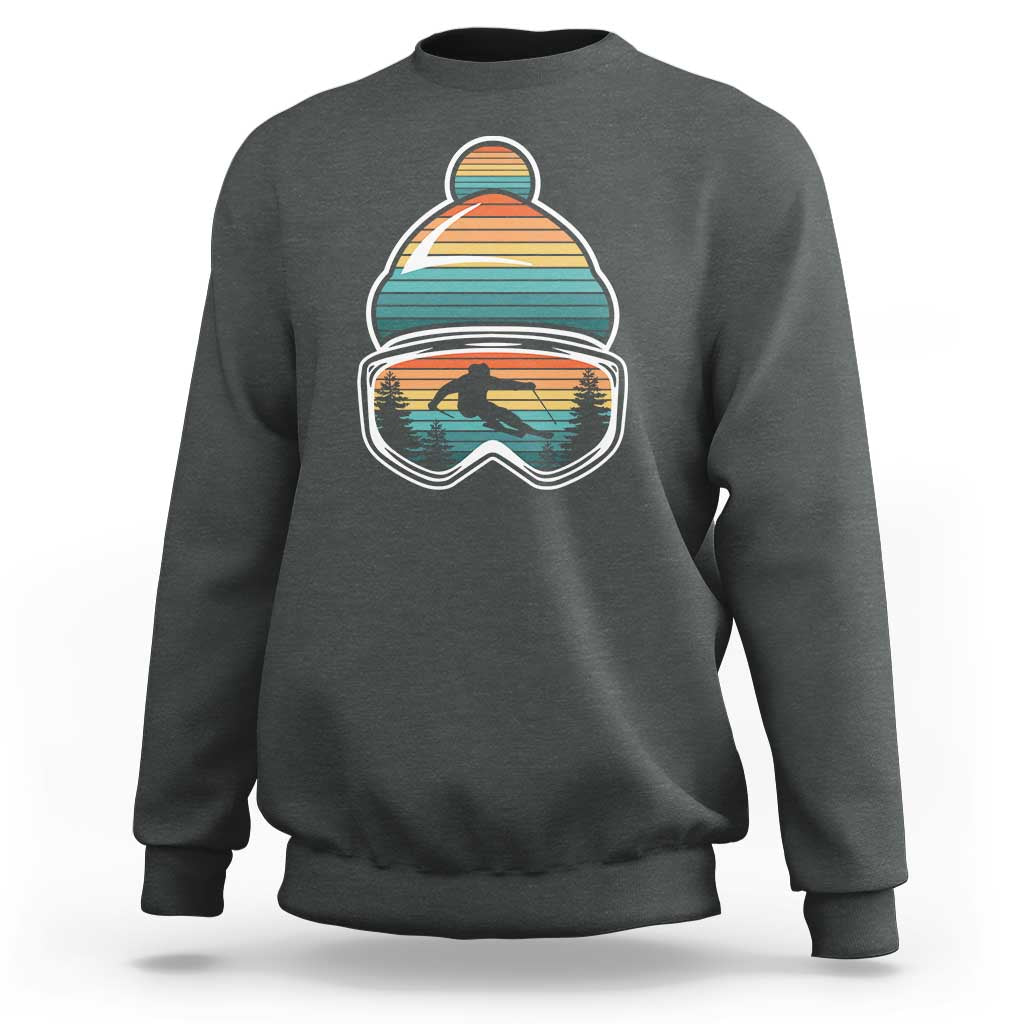 Ski-themed crewneck sweatshirt in charcoal gray with retro mountain goggles graphic