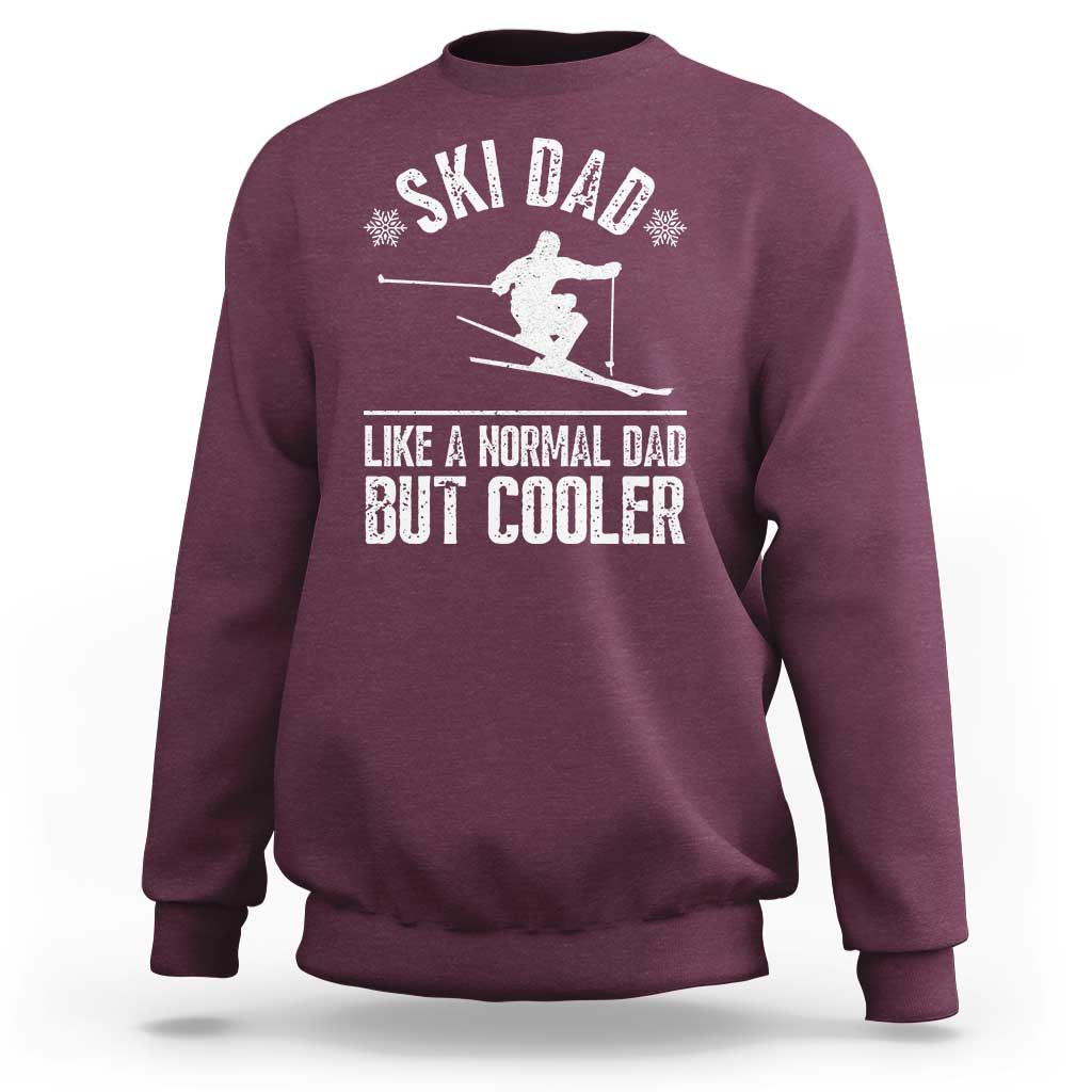 Maroon crewneck sweatshirt with white ski graphic and 'LIKE A NORMAL DAD BUT COOLER' text