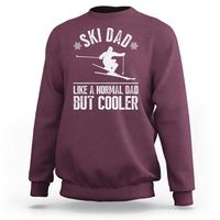Maroon crewneck sweatshirt with white ski graphic and 'LIKE A NORMAL DAD BUT COOLER' text
