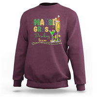 Maroon crewneck sweatshirt with Mardi Gras team graphic glitter print on front