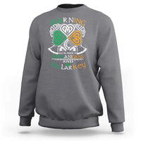 St. Patrick's Day crewneck sweatshirt in dark heather gray with white and green shamrock graphic