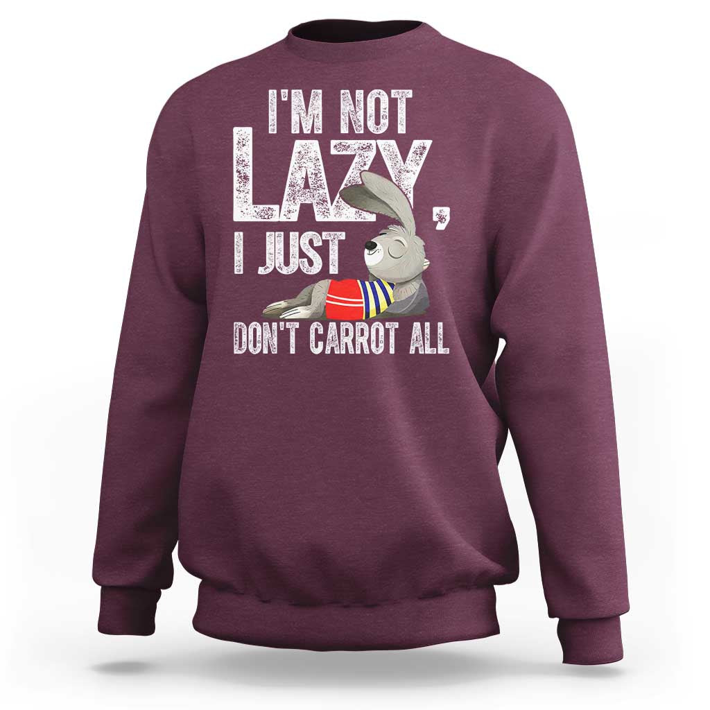 Maroon crewneck sweatshirt with bunny carrot joke graphic on front