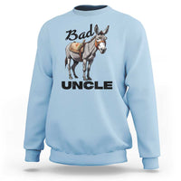 Light blue sweatshirt with donkey graphic and bold text “Bad UNCLE” on front.