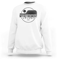 White crewneck sweatshirt with pickleball paddle graphic and 'Retirement Plan 2024' text