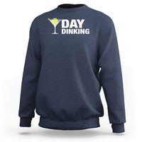 Navy blue pickleball sweatshirt with “Day Dinking” pickle drink graphic on front
