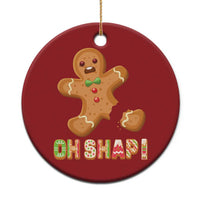 Round red gingerbread Christmas ornament with gold string and "OH SHAPI!" graphic