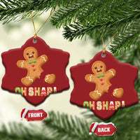 Snowflake-shaped gingerbread Christmas ornament with gold string and red "OH SHAPI!" front/back