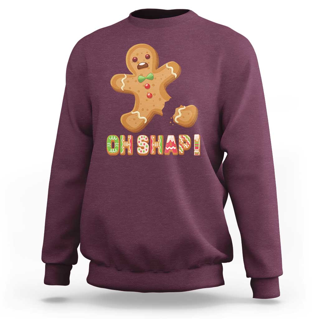 Maroon crewneck sweatshirt with gingerbread 'Oh Snap!' graphic on back